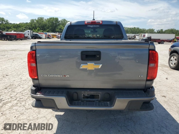 2018 Chevrolet Colorado 4WD LT with VIN 1GCGTCEN3J1105865, listed as a Copart auction lot 64291925 with 193,418 mi miles and Salvage title. Bid and sale history available at DreamBid. Image 6.