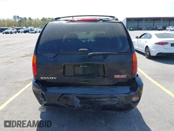 2007 GMC Envoy Denali with VIN 1GKES63MX72103849, listed as a IAAI auction lot 41904190 with 237,261 mi miles. Bid and sale history available at carsss.com. Image 14.