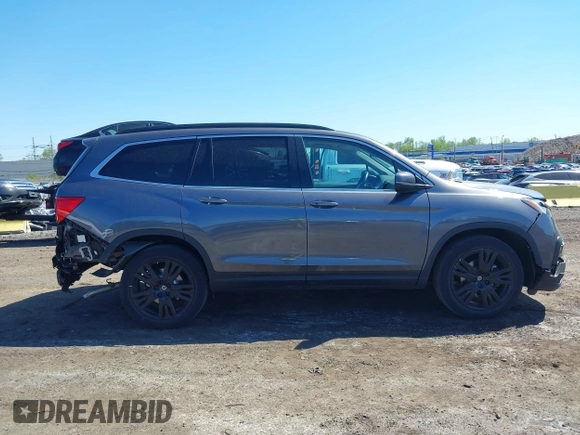 2021 Honda Pilot Special Edition z VIN 5FNYF6H27MB043638, wystawiony jako IAAI lot #42127878 z przebiegiem 50 401 mil mil oraz . Historia ofert i sprzedaży dostępna na DreamBid. Obrazek 13.