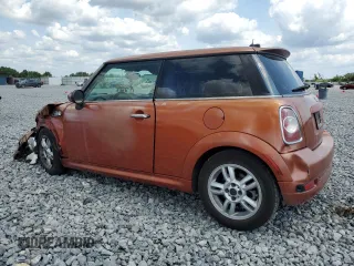 2011 MINI Hardtop with VIN WMWSU3C52BT094399, listed as a Copart auction lot 56561635 with 94,428 mi miles and Salvage Title. Bid and sale history available at DreamBid. Image 2.