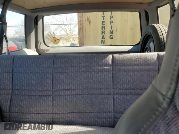 1997 Jeep Cherokee SE with VIN 1J4FT28S3VL523807, listed as a Copart auction lot 46674525 with 144,635 mi miles and Clean title. Bid and sale history available at DreamBid. Image 10.