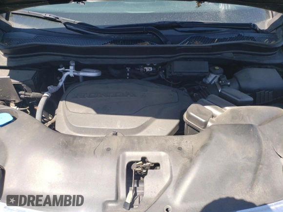 2022 Honda Pilot Elite z VIN 5FNYF6H03NB055138, wystawiony jako Copart lot #56964055 z przebiegiem 40 012 mil mil oraz Szkoda całkowita • Salvage title. Historia ofert i sprzedaży dostępna na DreamBid. Obrazek 12.