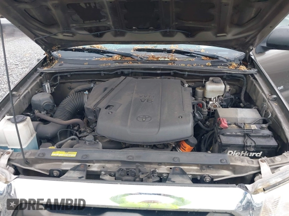 2015 Toyota Tacoma with VIN 3TMLU4EN1FM201554, listed as a IAAI auction lot 42008012 with 118,313 mi miles and . Bid and sale history available at DreamBid. Image 10.