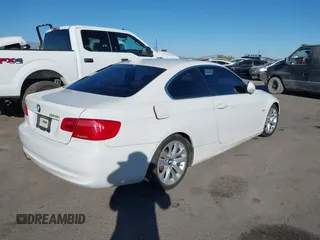2012 BMW 3 Series 328i with VIN WBAKE5C53CJ106162, listed as a IAAI auction lot 41330065 with 160,624 mi miles and . Bid and sale history available at carsss.com. Image 4.