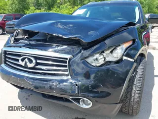2015 Infiniti QX70 with VIN JN8CS1MW1FM482625, listed as a IAAI auction lot 42332365 with 88,912 mi miles and . Bid and sale history available at DreamBid. Image 6.