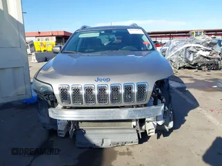 2020 Jeep Cherokee Latitude Plus with VIN 1C4PJLLB5LD521965, listed as a IAAI auction lot 41232028 with 77,729 mi miles. Bid and sale history available at carsss.com. Image 13.