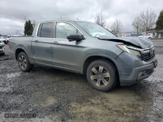 2017 Honda Ridgeline RTL-T with VIN 5FPYK3F69HB025784, listed as a Copart auction lot 48189915 with 164,176 mi miles and Salvage Title. Bid and sale history available at carsss.com. Image 4.