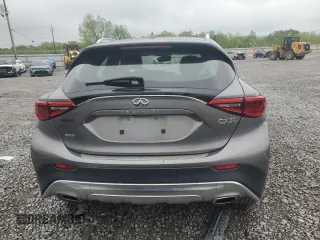 2018 Infiniti QX30 Premium with VIN SJKCH5CR7JA049931, listed as a Copart auction lot 52024955 with 94,588 mi miles and Clean title. Bid and sale history available at DreamBid. Image 6.