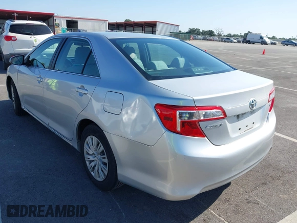 2014 Toyota Camry L with VIN 4T4BF1FK5ER442960, listed as a IAAI auction lot 42206639 with 119,639 mi miles and . Bid and sale history available at DreamBid. Image 3.