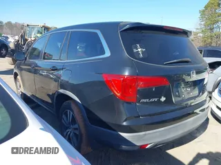2016 Honda Pilot EX-L with VIN 5FNYF5H59GB005482, listed as a IAAI auction lot 41304248 with 127,092 mi miles and . Bid and sale history available at DreamBid. Image 3.