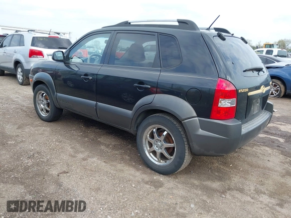 2005 Hyundai Tucson GLS with VIN KM8JN12D55U053476, listed as a IAAI auction lot 42118213 with 202,475 mi miles. Bid and sale history available at carsss.com. Image 3.