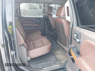 2015 Chevrolet Silverado 1500 High Country with VIN 3GCUKTEC0FG148198, listed as a IAAI auction lot 41493933 with 164,453 mi miles and . Bid and sale history available at DreamBid. Image 8.