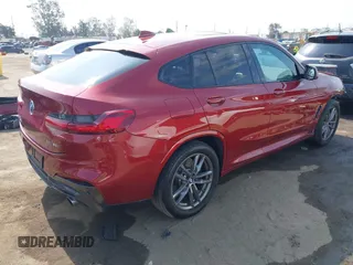 2021 BMW X4 xDrive30i with VIN 5UX2V1C09M9F29509, listed as a IAAI auction lot 42408605 with 46,992 mi miles and . Bid and sale history available at DreamBid. Image 4.