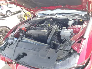 2024 Ford Mustang EcoBoost z VIN 1FA6P8TH2R5137890, wystawiony jako IAAI lot #41825638 z przebiegiem 6 144 mil mil oraz . Historia ofert i sprzedaży dostępna na DreamBid. Obrazek 10.