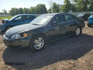 2014 Chevrolet Impala LT with VIN 2G1WB5E33E1117094, listed as a Copart auction lot 61718285 with 92,093 mi miles and Salvage title. Bid and sale history available at DreamBid. Image 1.