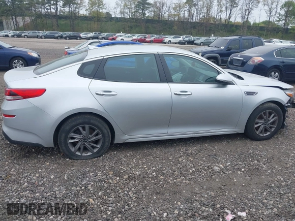 2020 Kia Optima LX z VIN 5XXGT4L38LG422703, wystawiony jako IAAI lot #39335033 z przebiegiem 73 037 mil mil oraz . Historia ofert i sprzedaży dostępna na DreamBid. Obrazek 13.