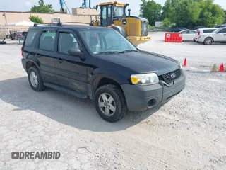 2007 Ford Escape XLS with VIN 1FMYU02ZX7KB90581, listed as a IAAI auction lot 42430544 with 164,595 mi miles and . Bid and sale history available at DreamBid. Image 1.