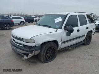 2004 Chevrolet Tahoe LT with VIN 1GNEC13Z74R313844, listed as a IAAI auction lot 41444672 with 233,620 mi miles. Bid and sale history available at carsss.com. Image 2.