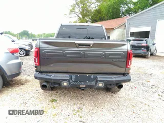 2017 Ford F-150 Raptor with VIN 1FTFW1RG8HFA31164, listed as a IAAI auction lot 42125542 with 164,745 mi miles and . Bid and sale history available at carsss.com. Image 16.