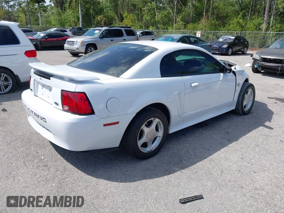 2004 Ford Mustang Standard with VIN 1FAFP40404F103699, listed as a IAAI auction lot 41804765 with 193,986 mi miles. Bid and sale history available at carsss.com. Image 4.