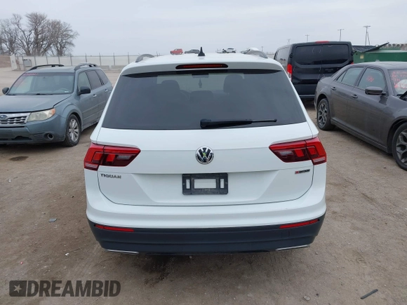 2021 Volkswagen Tiguan S z VIN 3VV0B7AX5MM071469, wystawiony jako IAAI lot #41716496 z przebiegiem 38 213 mil mil oraz . Historia ofert i sprzedaży dostępna na DreamBid. Obrazek 16.