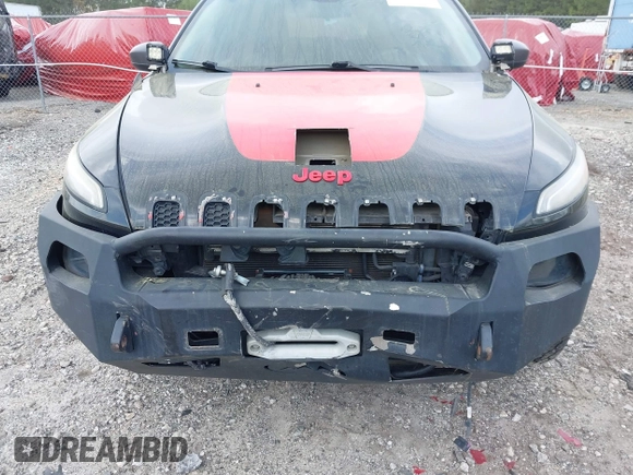 2015 Jeep Cherokee Trailhawk with VIN 1C4PJMBS5FW792184, listed as a IAAI auction lot 41827106 with 132,752 mi miles. Bid and sale history available at carsss.com. Image 6.