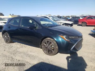 2019 Toyota Corolla Hatchback SE with VIN JTNK4RBEXK3029190, listed as a Copart auction lot 71320434 with 54,665 mi miles and Salvage Title. Bid and sale history available at carsss.com. Image 4.