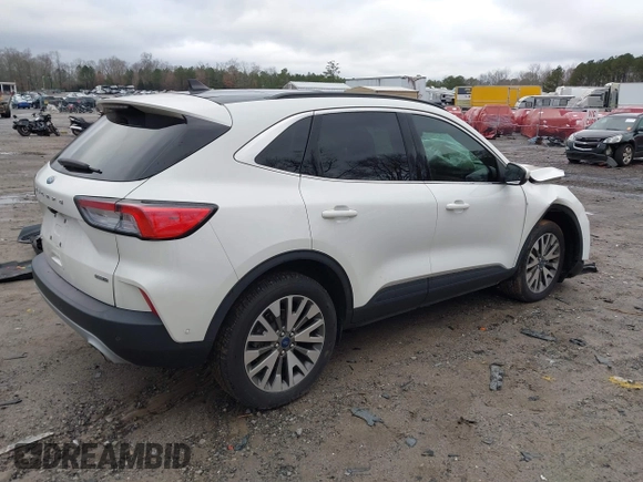 2020 Ford Escape Titanium Hybrid with VIN 1FMCU9DZ0LUC56274, listed as a IAAI auction lot 41256530 with 43,502 mi miles and . Bid and sale history available at DreamBid. Image 4.