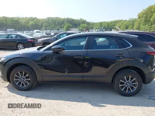 2021 Mazda CX-30 S with VIN 3MVDMBAL6MM264948, listed as a IAAI auction lot 42263077 with 13,614 mi miles and . Bid and sale history available at DreamBid. Image 14.