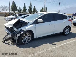 2017 Ford Focus SE with VIN 1FADP3K26HL223348, listed as a Copart auction lot 54056455 with 65,700 mi miles and Salvage Title. Bid and sale history available at carsss.com. Image 1.