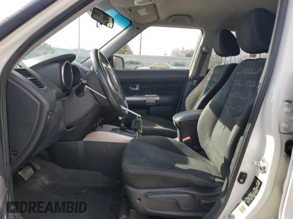 2012 Kia Soul + with VIN KNDJT2A67C7396384, listed as a Copart auction lot 49314415 with 218,562 mi miles and Salvage Title. Bid and sale history available at carsss.com. Image 7.