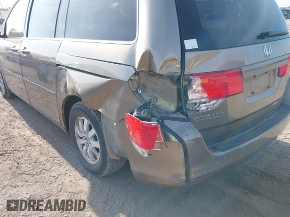2010 Honda Odyssey EX-L with VIN 5FNRL3H79AB048049, listed as a IAAI auction lot 42055090 with 142,736 mi miles. Bid and sale history available at carsss.com. Image 6.