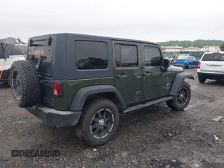 2007 Jeep Wrangler Unlimited X with VIN 1J4GA39127L231378, listed as a IAAI auction lot 42252475 with 152,568 mi miles and . Bid and sale history available at DreamBid. Image 4.