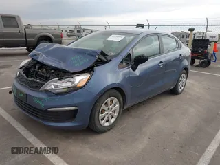 2016 Kia Rio LX with VIN KNADM4A39G6641920, listed as a IAAI auction lot 42158020 with 136,055 mi miles and . Bid and sale history available at DreamBid. Image 2.