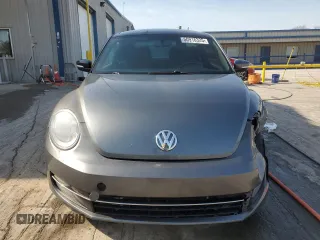 2012 Volkswagen Beetle with VIN 3VWV87AT3CM609968, listed as a Copart auction lot 50916325 with 148,004 mi miles and Salvage Title. Bid and sale history available at DreamBid. Image 5.