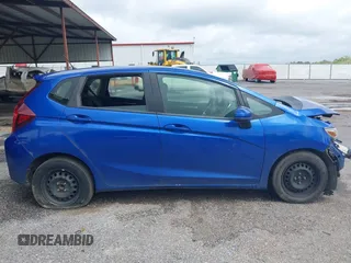 2015 Honda Fit LX with VIN 3HGGK5H58FM778365, listed as a IAAI auction lot 41901378 with 189,479 mi miles and . Bid and sale history available at DreamBid. Image 14.