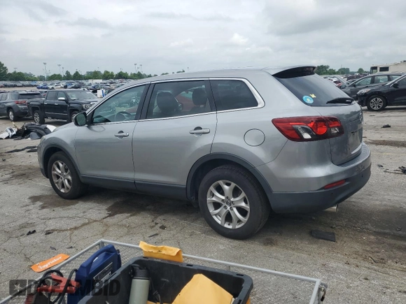 2014 Mazda CX-9 Touring с VIN JM3TB2CA2E0431879, выставлен на аукционе Copart как лот 64778845 с пробегом 145 476 миль миль и Чистый • Clean title. История ставок и продаж доступна на DreamBid. Изображение 2.