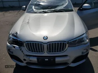 2016 BMW X4 xDrive28i with VIN 5UXXW3C57G0M89883, listed as a Copart auction lot 56080924 with 0 mi miles and Salvage Title. Bid and sale history available at carsss.com. Image 12.