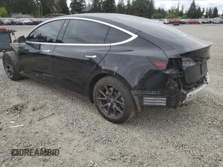 2019 Tesla Model 3 Mid Range z VIN 5YJ3E1EAXKF422500, wystawiony jako Copart lot #56065665 z przebiegiem 72 781 mil mil oraz Szkoda całkowita • Salvage title. Historia ofert i sprzedaży dostępna na DreamBid. Obrazek 2.