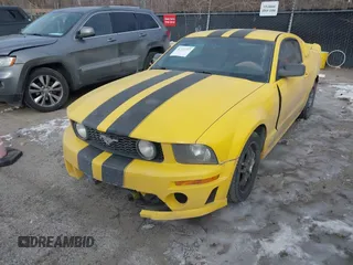 2005 Ford Mustang Deluxe with VIN 1ZVFT80N255238404, listed as a IAAI auction lot 41371727 with 150,443 mi miles. Bid and sale history available at carsss.com. Image 2.