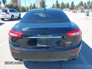 2014 Maserati Ghibli z VIN ZAM57XSA5E1091490, wystawiony jako IAAI lot #41848480 z przebiegiem 129 585 mil mil oraz . Historia ofert i sprzedaży dostępna na DreamBid. Obrazek 16.