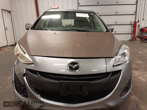 2012 Mazda 5 Sport z VIN JM1CW2BL1C0115371, wystawiony jako IAAI lot #42134834 z przebiegiem 138 840 mil mil oraz . Historia ofert i sprzedaży dostępna na DreamBid. Obrazek 12.