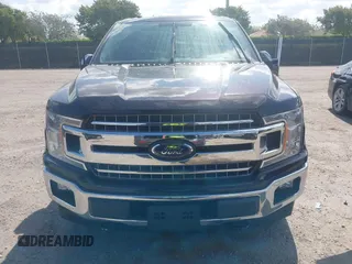 2018 Ford F-150 XL with VIN 1FTEW1EP8JFC77493, listed as a IAAI auction lot 42073382 with Not Provided miles and . Bid and sale history available at carsss.com. Image 11.