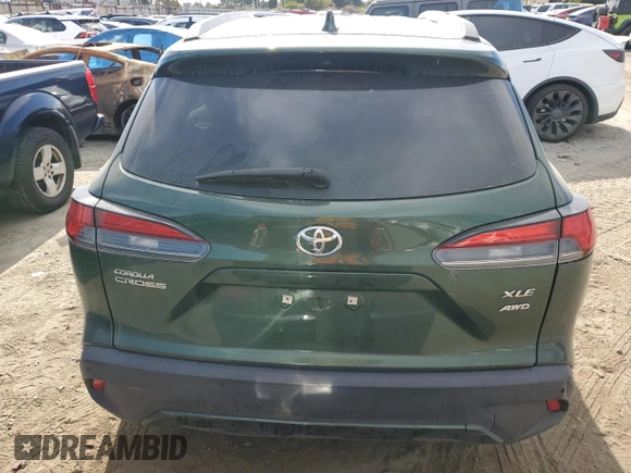 2023 Toyota Corolla Cross XLE z VIN 7MUDAABG2PV047865, wystawiony jako Copart lot #52755985 z przebiegiem 23 787 mil mil oraz Szkoda całkowita • Salvage title. Historia ofert i sprzedaży dostępna na DreamBid. Obrazek 6.