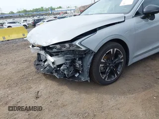 2023 Kia K5 GT-Line z VIN 5XXG64J26PG176483, wystawiony jako IAAI lot #42154614 z przebiegiem 61 050 mil mil oraz . Historia ofert i sprzedaży dostępna na DreamBid. Obrazek 6.