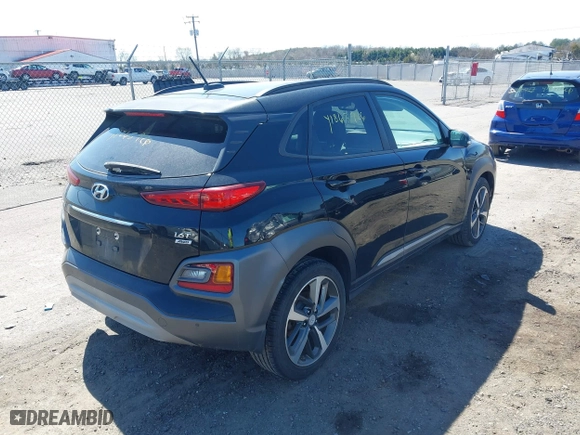 2018 Hyundai Kona Ultimate with VIN KM8K5CA50JU118013, listed as a IAAI auction lot 41863926 with 138,772 mi miles. Bid and sale history available at carsss.com. Image 4.
