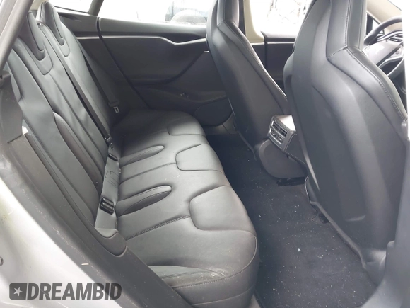 2014 Tesla Model S 60 with VIN 5YJSA1H12EFP32213, listed as a IAAI auction lot 42194085 with 56,071 mi miles and . Bid and sale history available at DreamBid. Image 8.