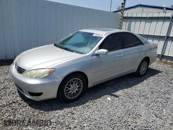 2006 Toyota Camry LE z VIN 4T1BF30K16U630147, wystawiony jako Copart lot #59696815 z przebiegiem 168 727 mil mil oraz Czysty tytuł • Clean title. Historia ofert i sprzedaży dostępna na DreamBid. Obrazek 1.