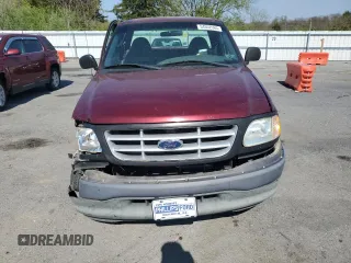 2003 Ford F-150 XL with VIN 1FTRF17293NA33833, listed as a Copart auction lot 54552965 with 70,016 mi miles and Salvage Title. Bid and sale history available at DreamBid. Image 5.
