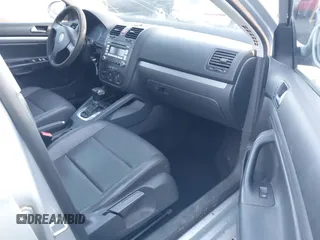 2007 Volkswagen Jetta 2.5 z VIN 3VWRG71K37M029136, wystawiony jako IAAI lot #41291108 z przebiegiem 219 980 mil mil oraz . Historia ofert i sprzedaży dostępna na DreamBid. Obrazek 5.